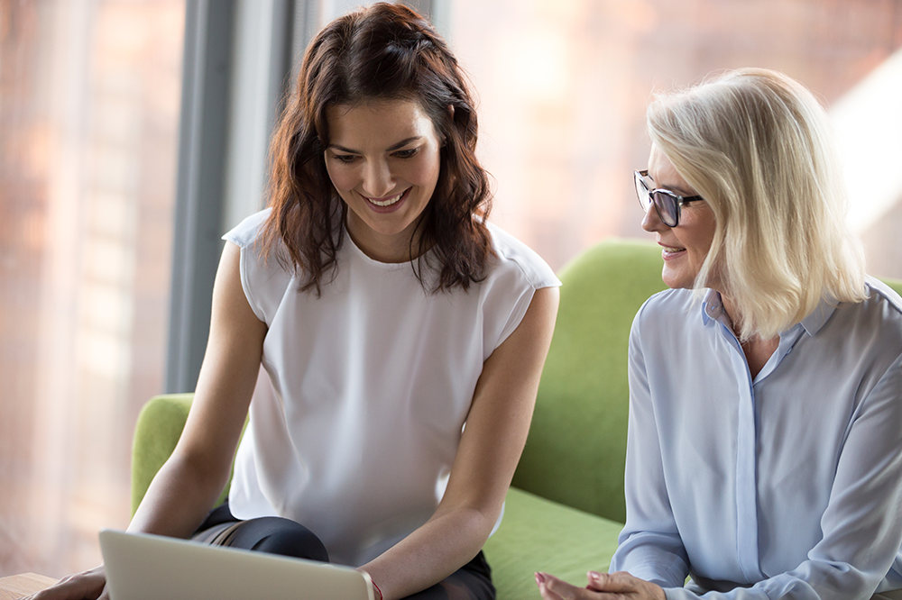 Casual business meeting young woman and senior woman Casual business meeting young woman and senior woman | SmartFee