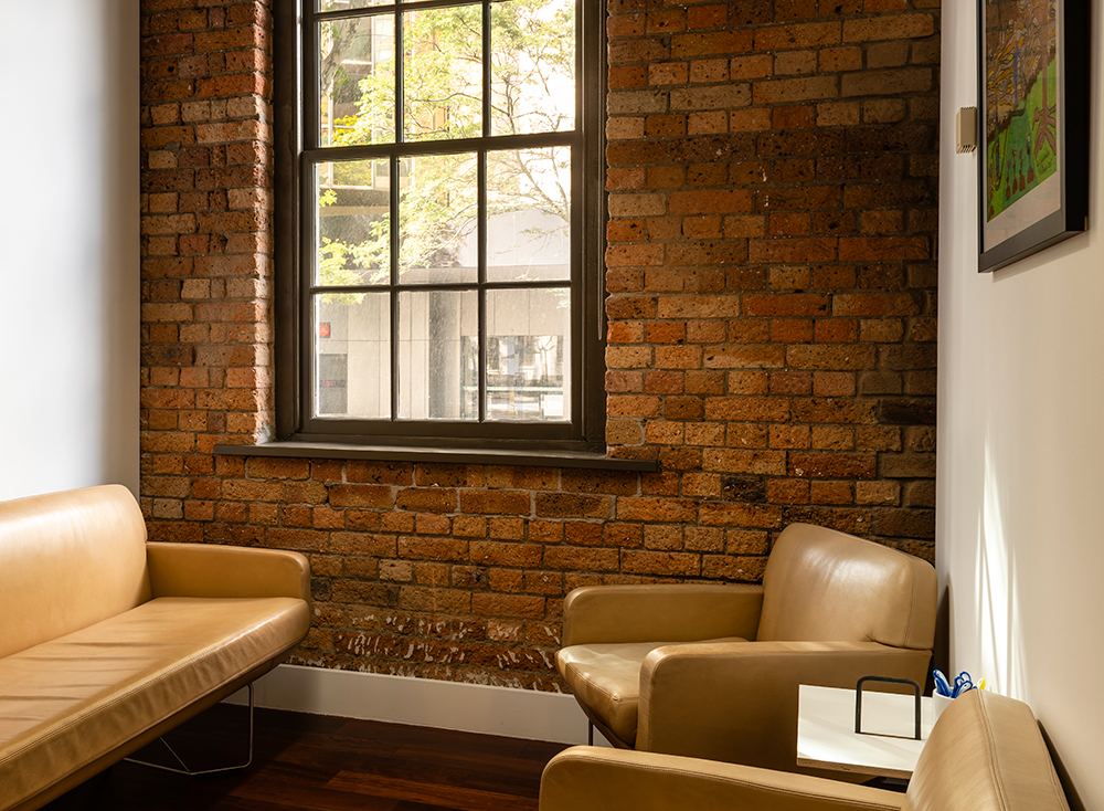 Modern Loft Office A modern loft office with brick walls | SmartFee